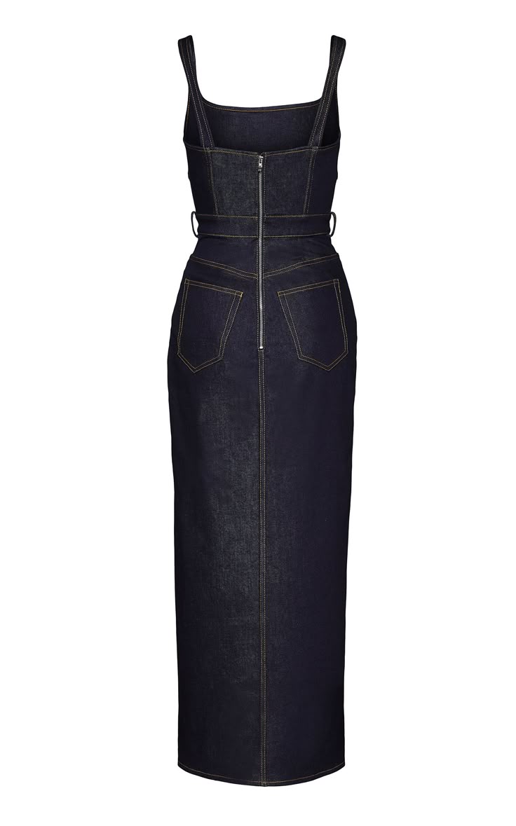a back view of a navy blue denim midi dress with a sheath silhouette. the dress features thick shoulder straps, a straight neckline, a fitted bodice with a belted waist, and a fulllength skirt. the back of the dress has a silver zipper closure and two square pockets. the dress is made of denim and has yellow stitching details.