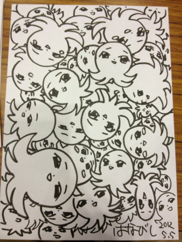 this is a black and white doodle on white paper of many cute cartoon faces with spiky hair, drawn in a whimsical style and clustered together.  there is japanese writing and the date 2012 in the bottom right corner.