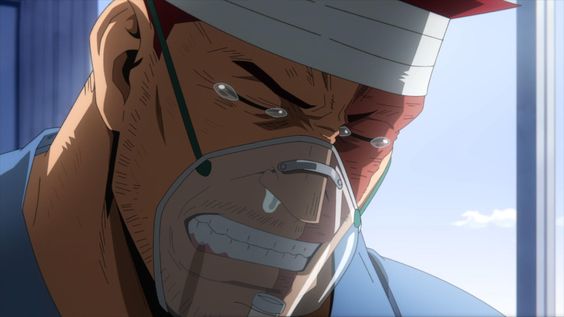 a closeup shot of a muscular man with reddish hair and a bandage wrapped around his head. he has tears streaming down his face, his expression contorted in a mixture of pain and sadness. a clear plastic oxygen mask covers his mouth and nose. the background suggests a sterile environment, likely a hospital room, with a window allowing bright light to illuminate the scene.