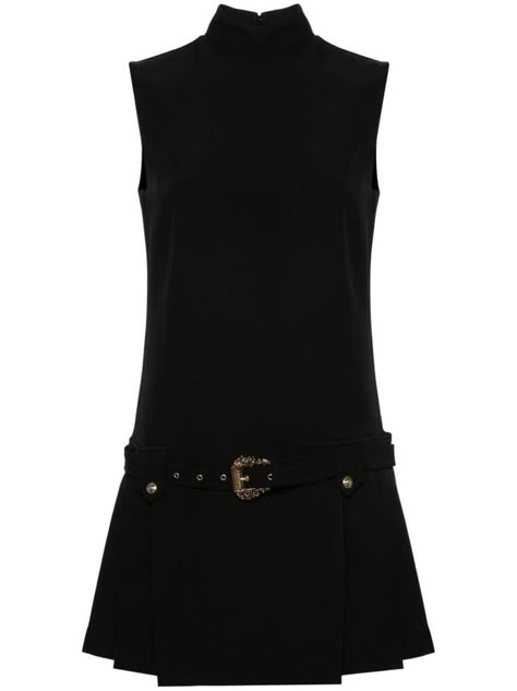 a black sleeveless mini dress with a high neck, a buckle belt, and a pleated skirt. the dress is simple and elegant, and perfect for a formal occasion.