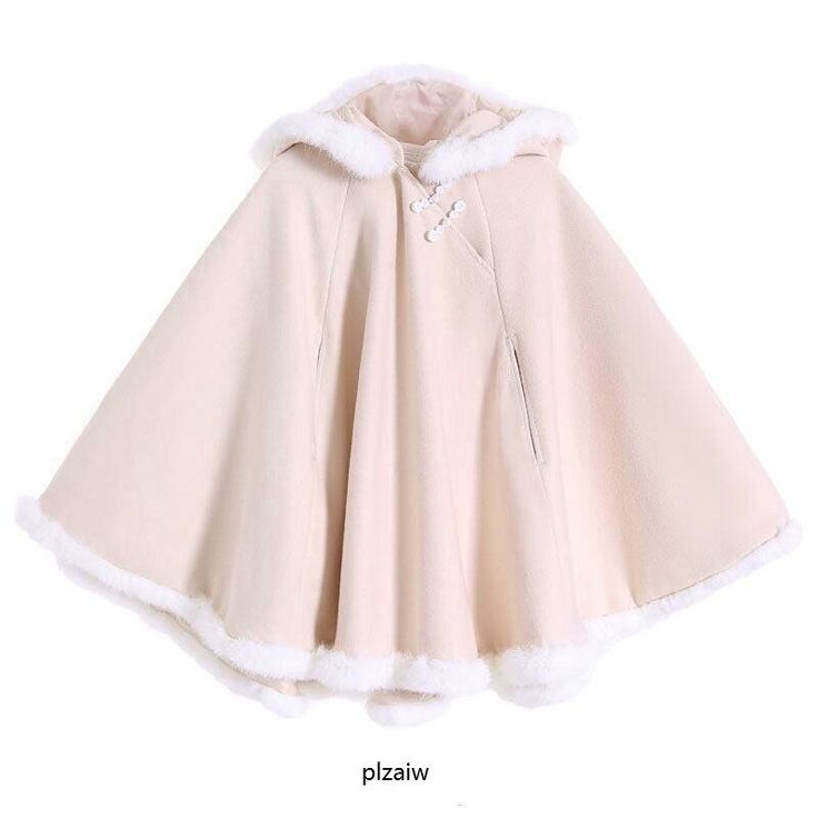 a creamcolored hooded cape with faux fur trim is displayed against a white background. the cape, designed for women, has a classic and elegant style, suggesting it's intended for winter wear. it features a button closure at the neck and a subtle aline silhouette.