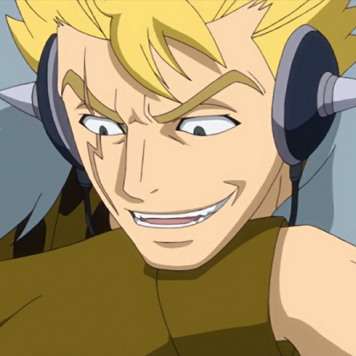 a closeup shot of an anime character's face.  he has blond hair, is wearing headphones and is grinning with an evil expression.