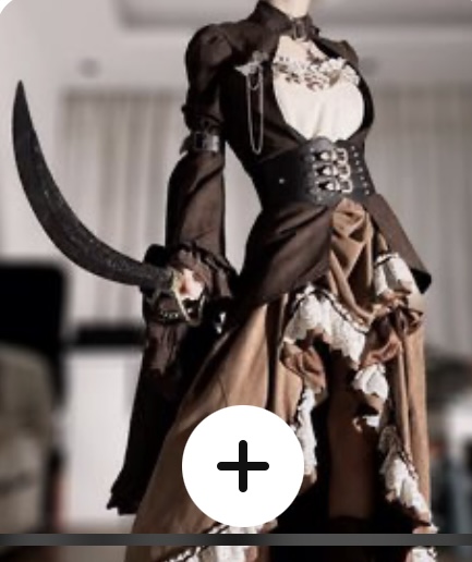a woman is shown from the knees up, wearing an elaborate steampunkinspired outfit.  the outfit is brown and cream and features a corset, a long skirt with lace trim, a jacket, and a necklace. she is holding a curved sword in her right hand, with the tip pointing down. the image appears to be taken indoors in soft lighting.
