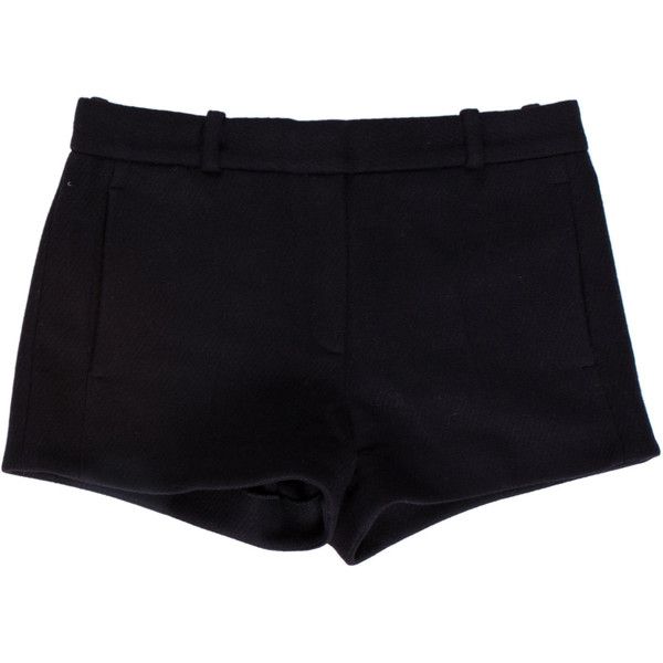 a pair of black shorts are shown on a white background. they have belt loops and a simple, tailored design.