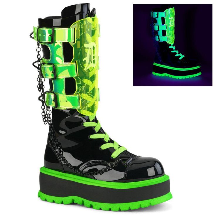 a pair of black platform boots with green accents. the boots have lace up fronts, buckles and chains. the boots are shown in a split image with the right boot showing the black and green boots, and the left boot showing the boots in a dark environment where the green accents glow.