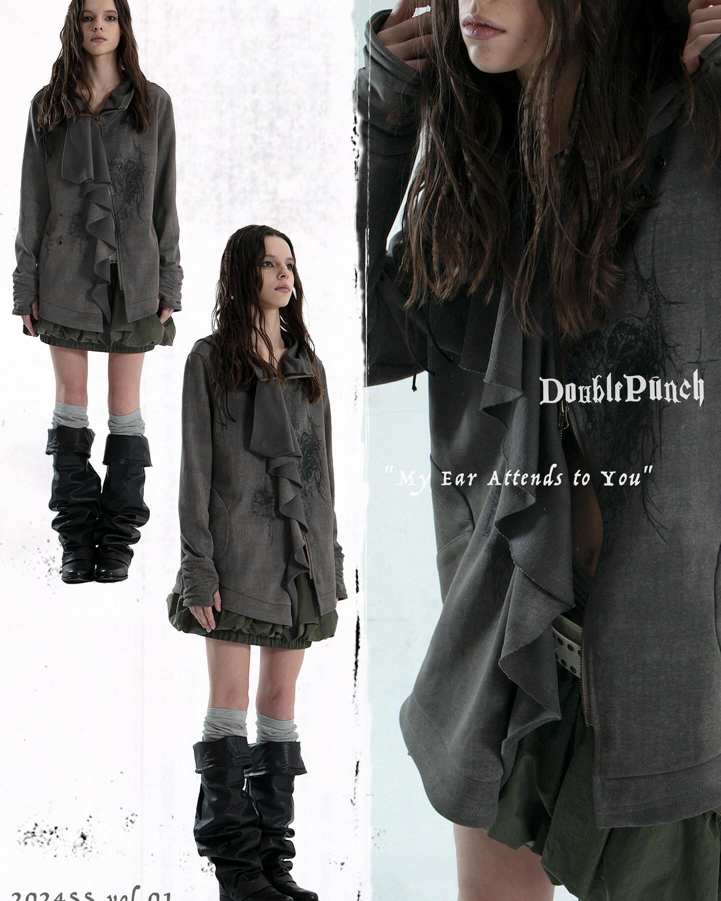 the image showcases a fashion photoshoot for the brand "double punch," featuring a grey hoodie with ruffle detailing. the collection is named "my ear attends to you".  the photoshoot uses three different shots of models showcasing the hoodie and a complementary olive green skirt.  the models are wearing the same gray hoodie with ruffled details paired with kneehigh boots and socks. the overall aesthetic is dark, edgy, and slightly gothic with a grunge vibe. the photos are welllit and highlight the texture and details of the clothing.