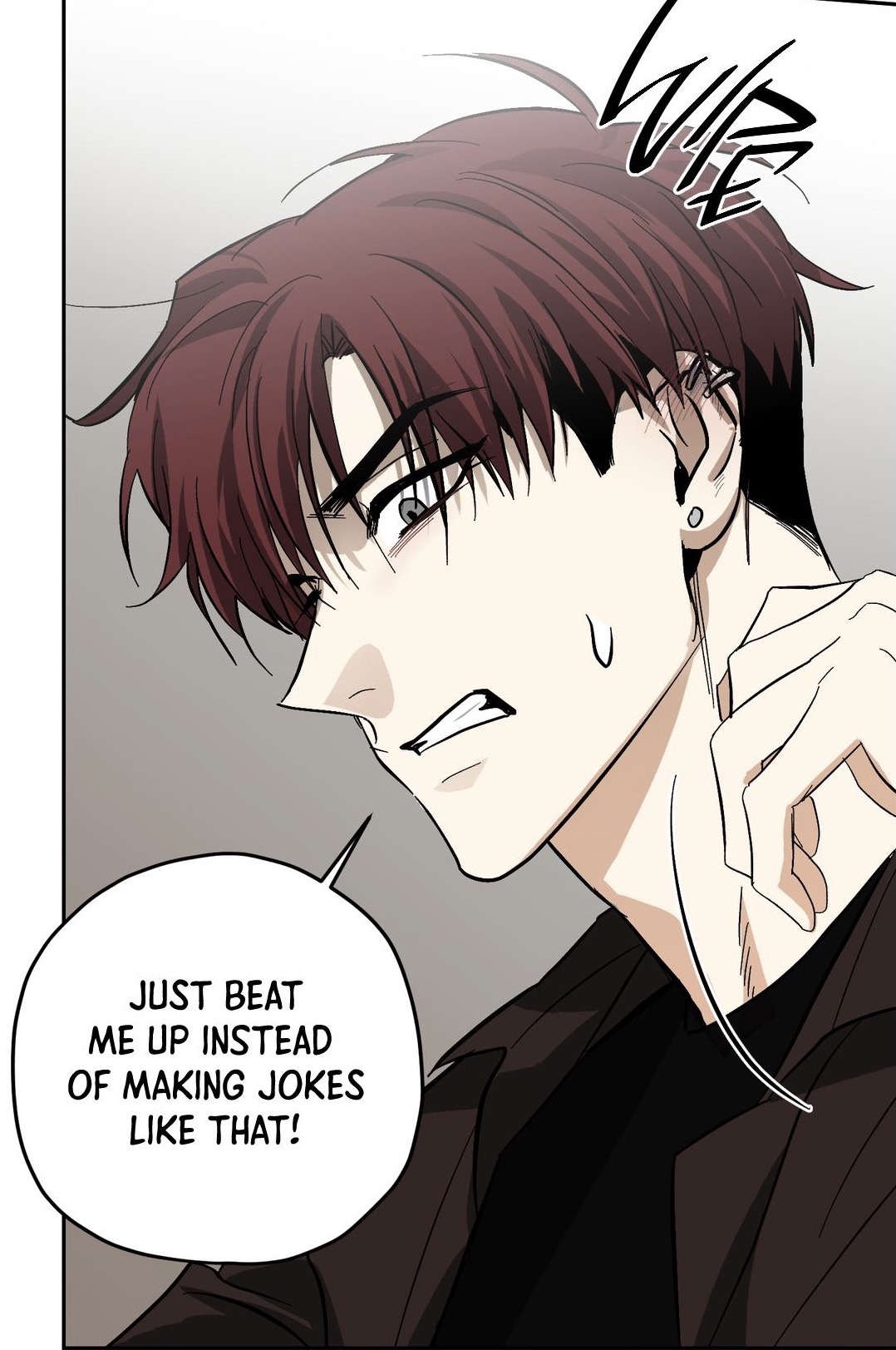 the image is a closeup panel from a manhwa (korean comic) or manga. it features a young man with reddishbrown hair, who appears angry or frustrated. his expression is intense, and he has a hand near his neck. he is wearing dark clothing. a speech bubble contains the text "just beat me up instead of making jokes like that!". the art style is typical of manhwa/manga, with sharp lines and shading to emphasize emotion.  the background is muted and simple, focusing attention on the character's face and expression.