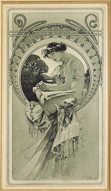 the image is a monochrome illustration in an art nouveau style, depicting a woman seated and reading a book. she wears a loose dress or robe, sandals, and a wreath on her head. the figure is framed within an oval shape, which is surrounded by decorative art nouveau elements, including stylized floral and geometric patterns. the scene includes a background with trees. the illustration is itself framed by a simple, golden frame.