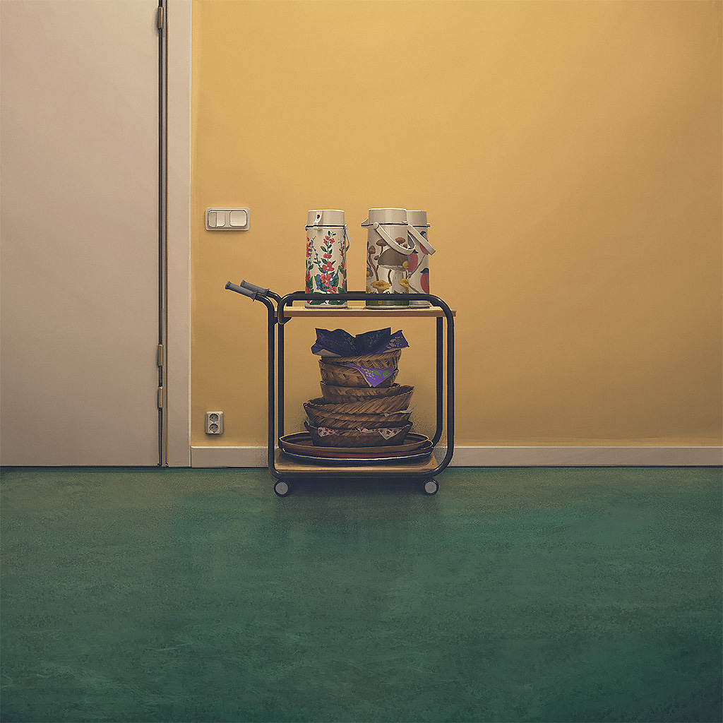 a black metal cart with a wooden top sits in a room with a yellow wall and a green floor. the cart is holding a variety of items, including three colorful thermoses, four woven baskets, three plates, and a large, woven placemat.