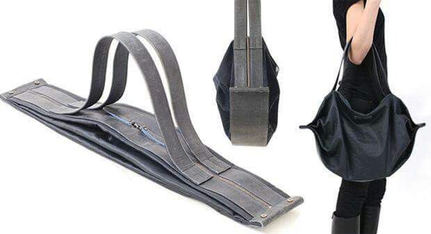 the image shows three different views of a gray bag that can be folded flat. on the left, the bag is shown completely flat, with two gray straps extending from the top. in the center, the bag is shown partially folded. on the right, a woman is carrying the bag, which is black in color.