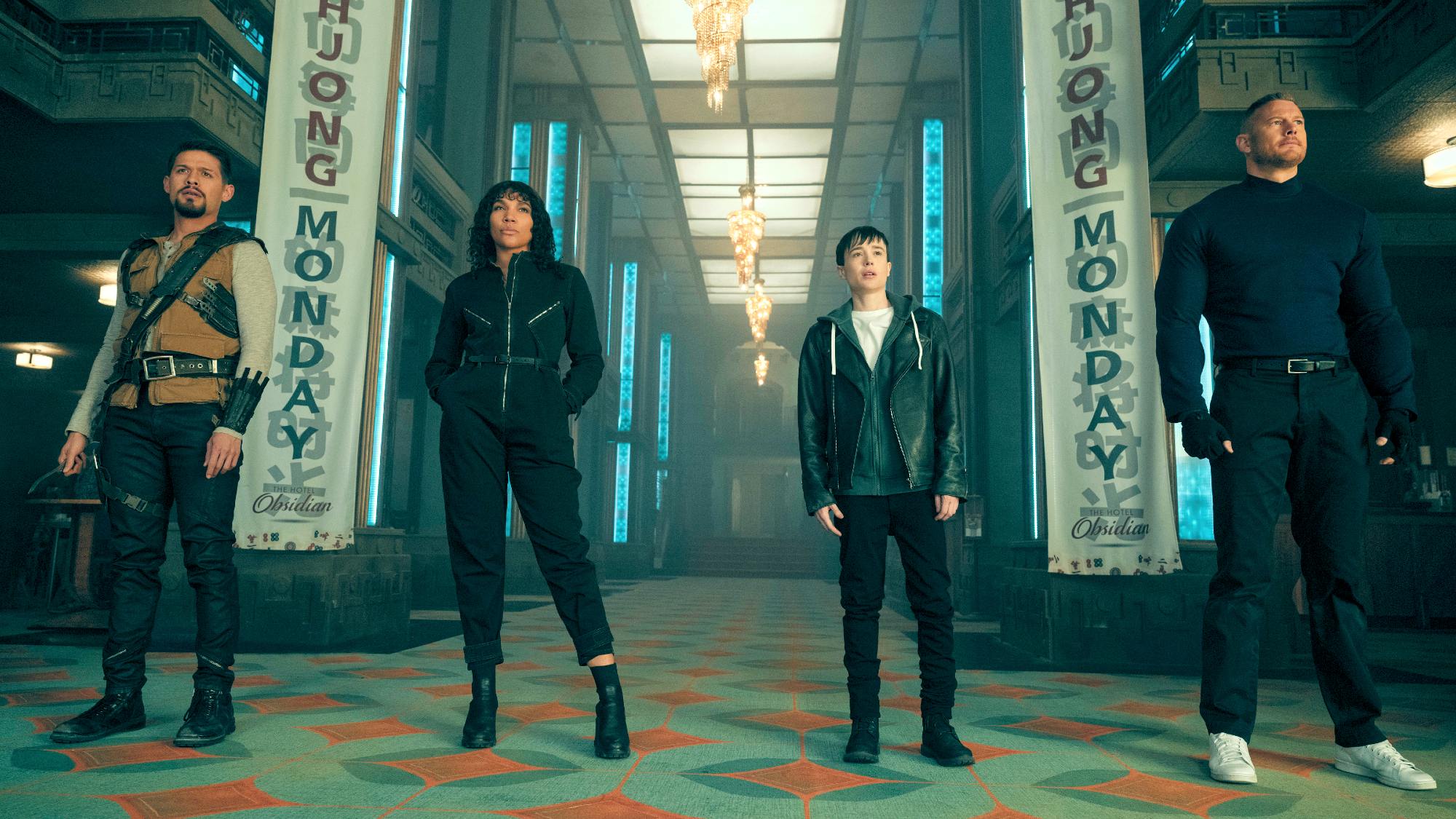 four people stand in an elaborately decorated hallway with a vintage, possibly futuristic, aesthetic. the walls are lined with turquoise panels accented with gold.  the floor is a patterned green and gold carpet. overhead lights cast a bright glow on the scene.  large banners reading "hargreeves" and "monday" flank the hallway. the individuals are dressed in a mix of modern and stylized clothing, suggesting a genrebending narrative.