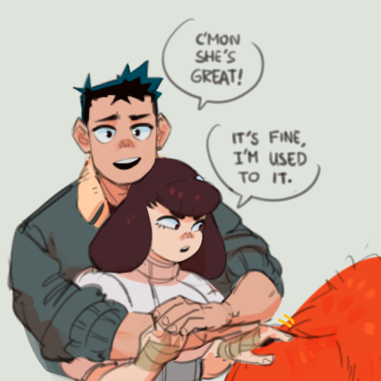 a cartoon illustration of a couple hugging each other. the man has blue hair and is wearing a grey jacket. he has his arm around the woman, who has dark brown hair. she is wearing a white shirt. there is a speech bubble above the man's head that says "c'mon she's great!". there is another speech bubble above the woman's head that says "it's fine, i'm used to it". there is a red object in the background of the image.