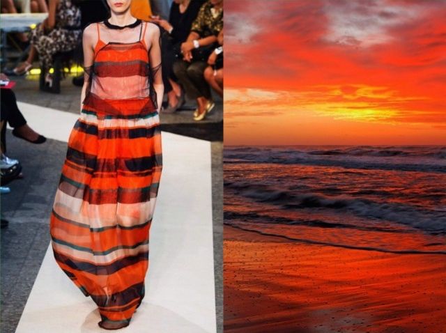 the image is a split image with a fashion model on a runway on the left side and a sunset over the ocean on the right side. the model is wearing a long, striped dress that is very colorful and vibrant. the sunset is a beautiful orange and red color, and the ocean is a deep blue. the image is a great example of how fashion can be inspired by nature.