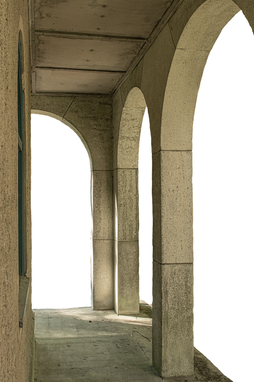 a photo of an arched hallway with stone columns on a dark night. the hallway leads into a seemingly endless tunnel. the architecture is old and constructed from stone. light from an unknown source casts shadows on the columns and floor, creating a sense of depth and mystery. the image appears to be taken at night, with a dark background behind the archways.