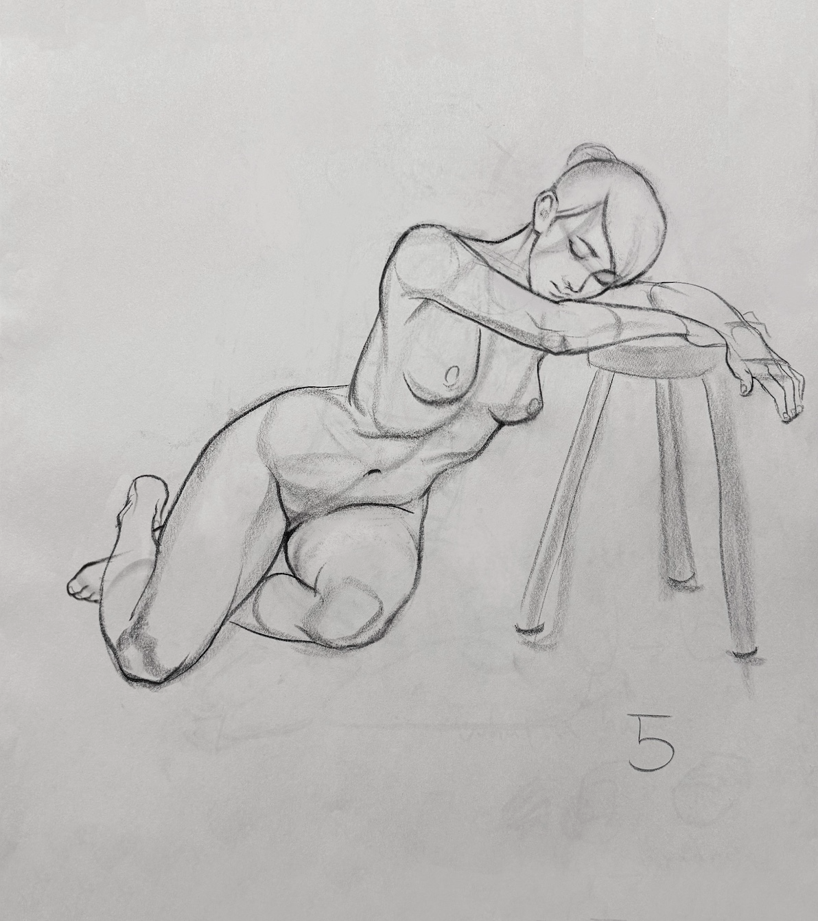 a charcoal drawing of a nude female figure lying on her side with her head resting on a stool. the figure is drawn in a gestural style, with loose lines and a focus on capturing the overall form and movement of the body. the drawing is set against a white background.
