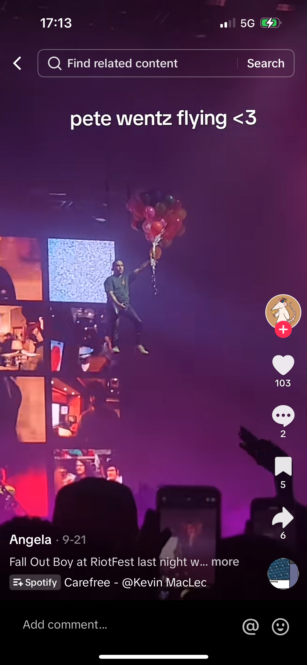 this is a screenshot of a social media post featuring a video of pete wentz from fall out boy singing at a concert. the video was taken by a fan in the crowd and is captioned "pete wentz flying <3". the post also features a comment from a user named angela who says "fall out boy at riotfest last night w... more" with a link to spotify for the song "carefree" which is a song by fall out boy. the image includes various social media icons such as hearts, comment bubbles, a share arrow, and a smile emoji. the post has garnered many likes and comments, indicating its popularity among fans.