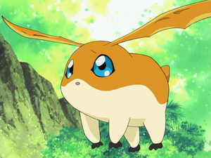 a cartoon depiction of a yellow and white, fourlegged animal with long, pointy ears that resemble wings. it has big, blue eyes and a small, black nose. it appears to be standing on a tree branch, surrounded by green foliage. the background is brightly lit and features more greenery and a rocky mountain.