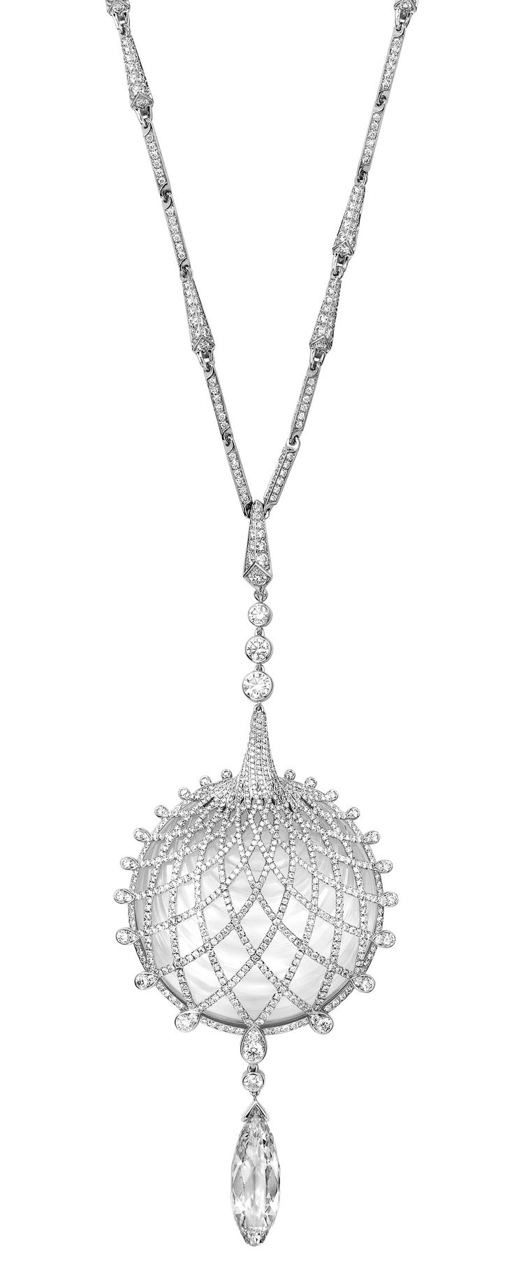 a luxurious diamond necklace with a delicate pendant shaped like a sphere. the pendant is ornately crafted and features intricate designs. the necklace is made of white gold and the diamonds sparkle with incredible brilliance. this stunning piece is perfect for any occasion, and is sure to make a statement.