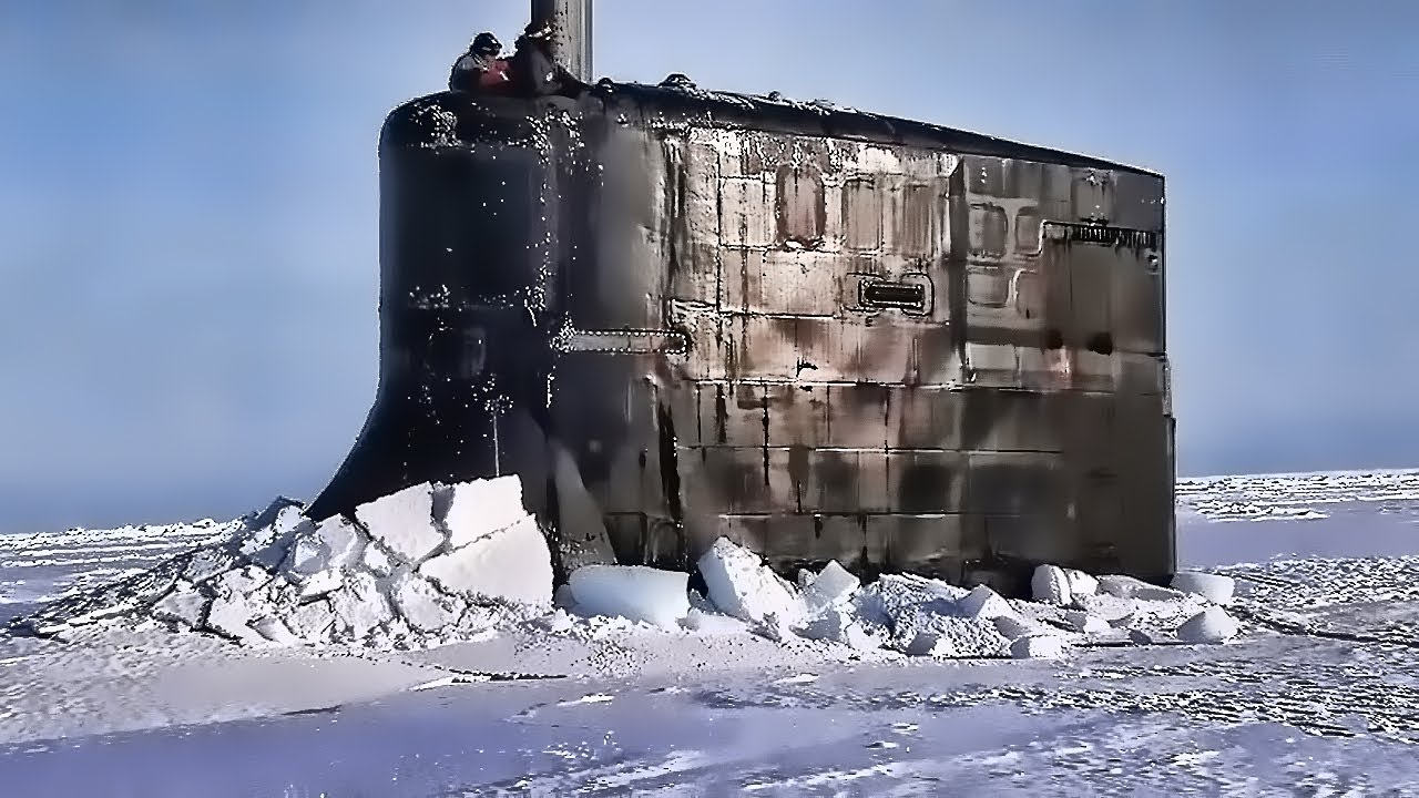 a submarine is partially submerged in a frozen arctic sea, with ice surrounding it. the submarine is dark grey and has a tall, cylindrical conning tower. the ice is white and broken into chunks, creating a dramatic and rugged landscape. the scene is a testament to the harsh and unforgiving nature of the arctic, and the challenges of navigating and operating in this extreme environment.