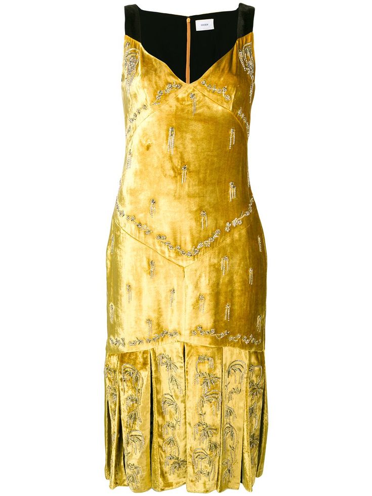 a yellow velvet dress with beaded embroidery and a pleated skirt. the dress has a vneckline and is sleeveless. it is midi length. the dress is vintageinspired and would be perfect for a party or cocktail event.