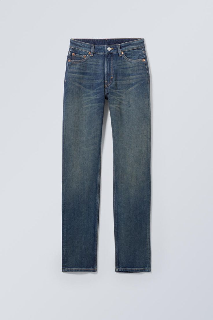 the image features a pair of straight leg denim jeans on a plain background. the jeans are a medium blue with a vintage wash, giving them a textured appearance. they have pockets on the front and back, a button closure at the waist, and are made of a cotton material.