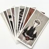 a fan of tarot cards is displayed against a white background. the card on the right features an illustration of a figure with a headdress. other cards in the fan show various designs and patterns.