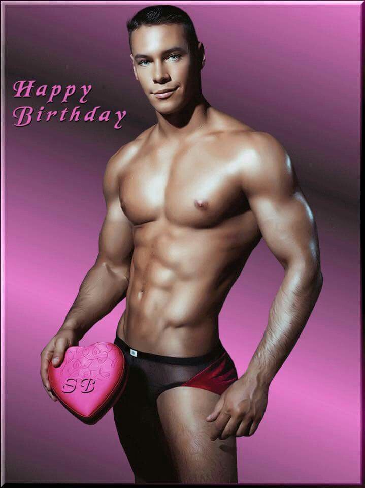 the image is a birthday greeting card featuring a muscular man holding a heartshaped box. he is shirtless, wearing darkcolored underwear with a red accent.  the background is a solid, dark pink. the text "happy birthday" is prominently displayed in a cursive font. the overall tone is suggestive and sensual.