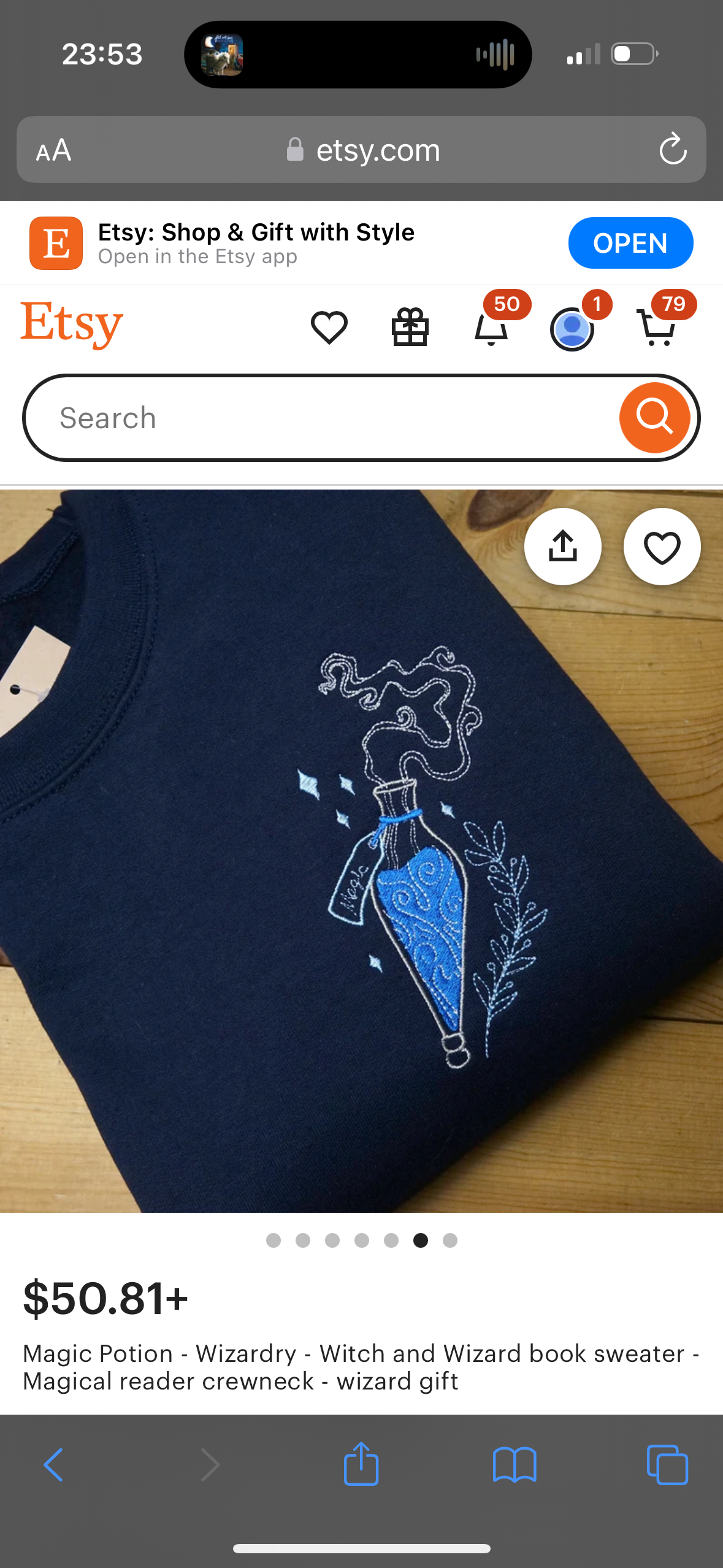 this is a picture of a navy blue sweatshirt with white embroidery of a blue potion bottle with steam coming off of it. the words "magic potion" are embroidered on the tag of the sweatshirt. below the image are a price tag with "50.81+" written and a description for the item, which is "magic potion  wizardry  witch and wizard book sweater  magical reader crewneck  wizard gift."