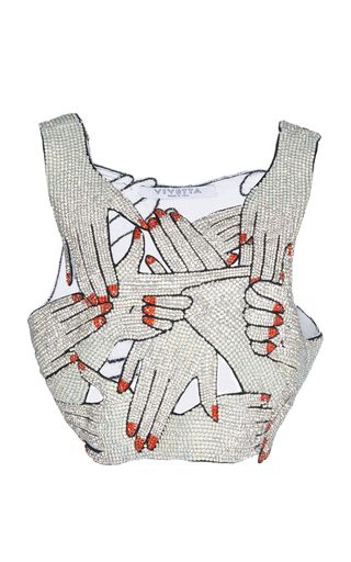 a cropped sleeveless top with a pattern of hands outlined in black with red nail polish, set against a white background.