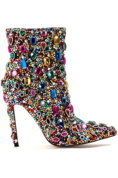 a vibrant, colorful highheeled boot covered in an intricate array of jewels, rhinestones, and embellishments. it boasts a pointed toe and a stiletto heel, making it a dramatic and eyecatching footwear choice for a special occasion. the shoe's design exudes a sense of opulence and glamour, perfect for adding a touch of sparkle to any outfit.