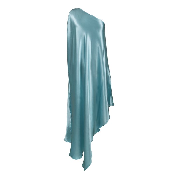 a flowing, oneshoulder dress made of soft blue satin. the dress has an asymmetrical design, with one side draped over the shoulder and the other side falling to the thigh. the fabric is luxuriously soft and drapes beautifully, making it perfect for a formal event or evening wear.