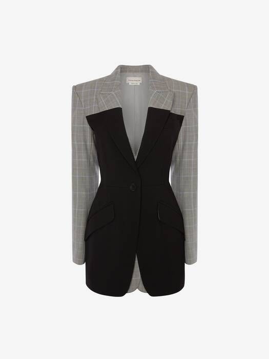 a blazerstyle dress with a black front panel and gray plaid sleeves and shoulder. the dress has a single button closure, two pockets, and a collar.