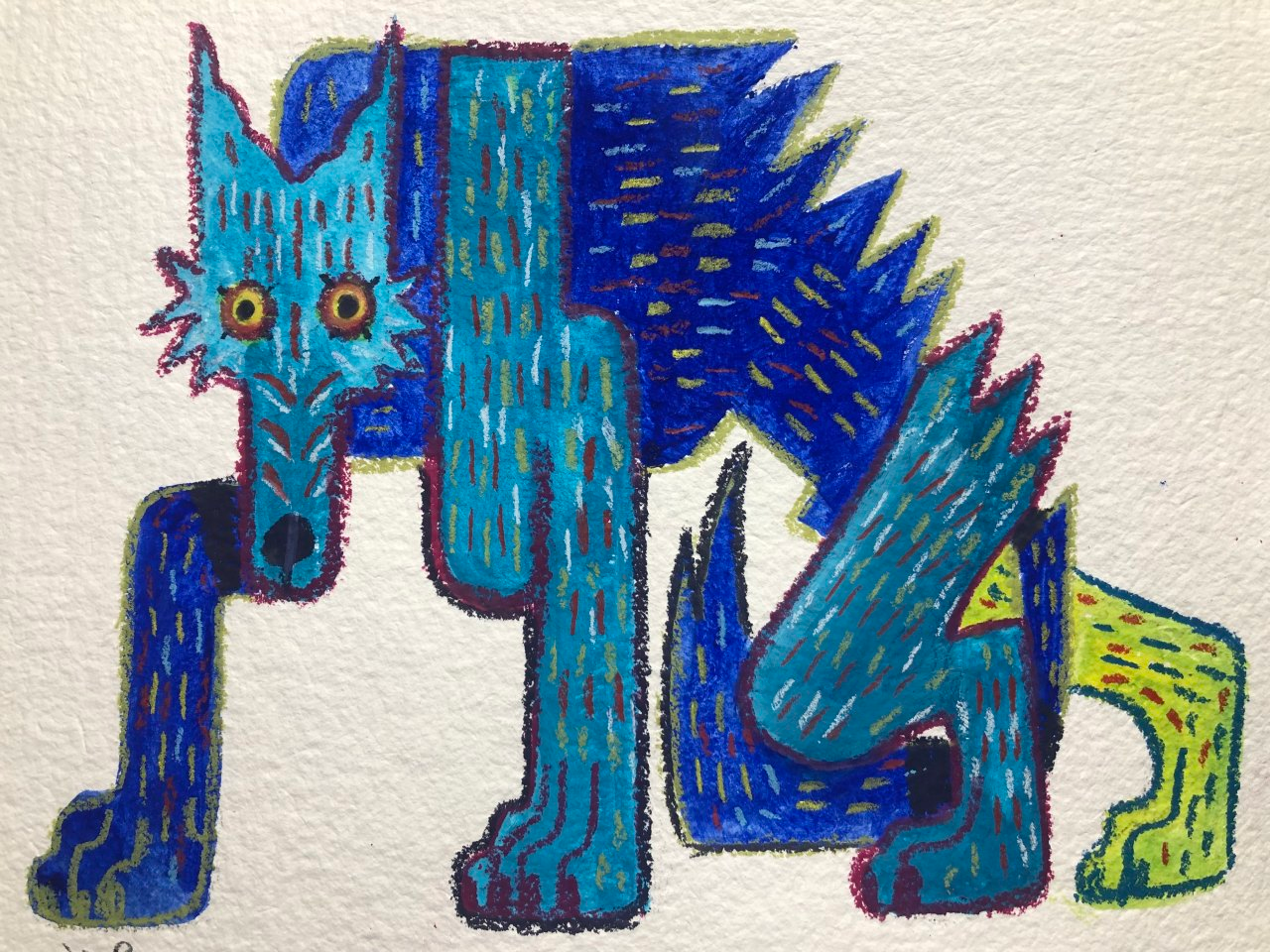the image is a drawing of a stylized blue wolf with green and yellow accents, crouched low to the ground as if stalking something. it's drawn in a folk art style with bold lines and flat colors. the wolf's body is covered in short, dashlike strokes of various shades of blue, giving it a textured appearance. its eyes are wide and yellow, giving it an alert expression.