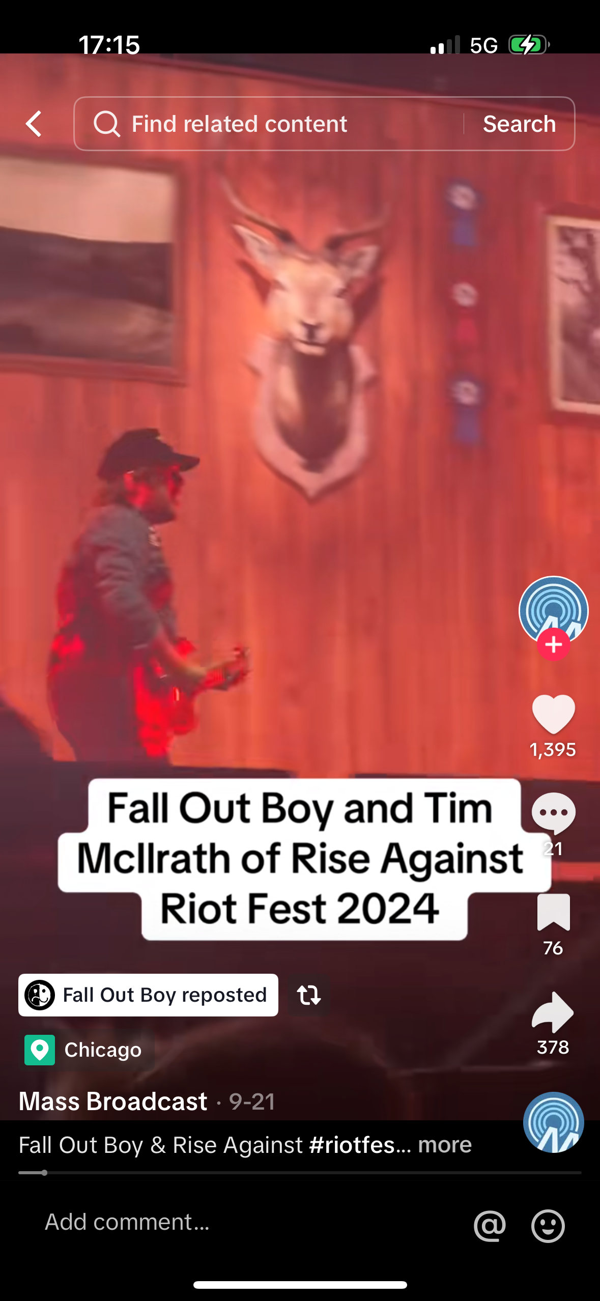 a screenshot of a video from the mass broadcast tiktok account. it shows fall out boy and tim mcilrath of rise against at riot fest 2024. tim is on stage playing guitar. the video has over 1,300 likes, 76 shares, and 378 comments. fall out boy reposted the video.