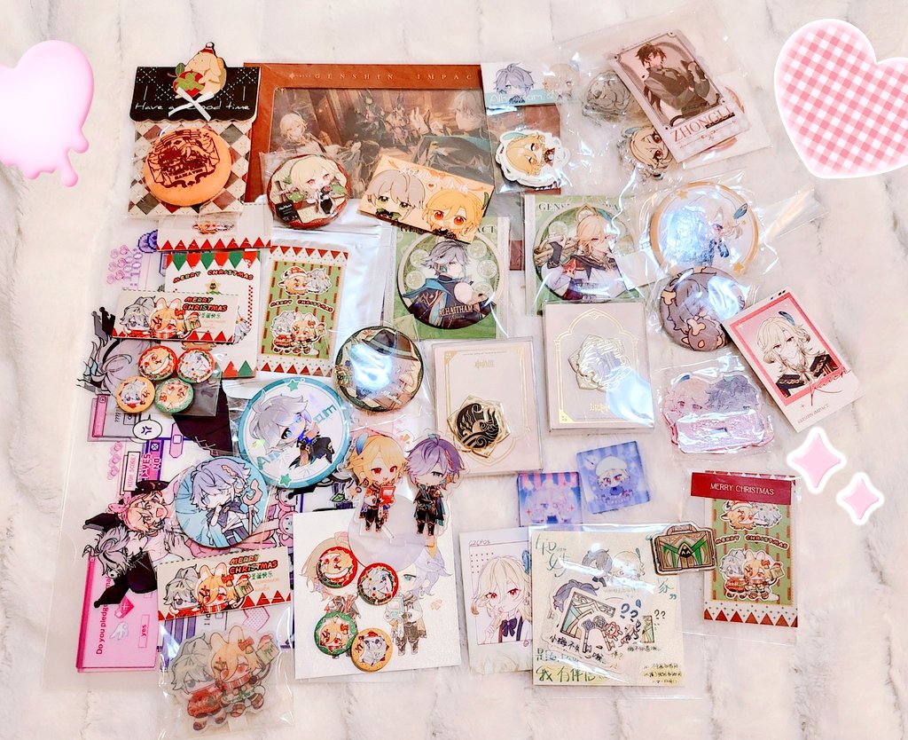 a collection of anime pins, stickers and buttons featuring characters from genshin impact, a popular video game. the collection is laid out on a table, with a variety of themes, including christmas and cute characters.