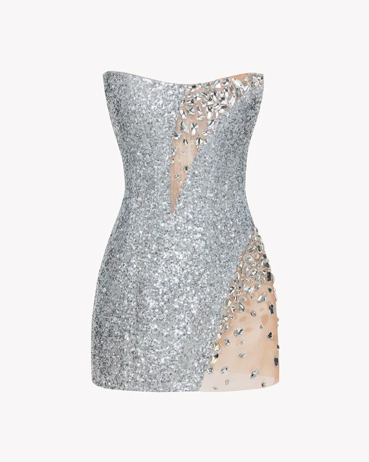 a silver, strapless mini dress covered in sequins and embellishments. the dress features nude paneling on the side and front, creating a sheer effect. it is a cocktail or party dress.