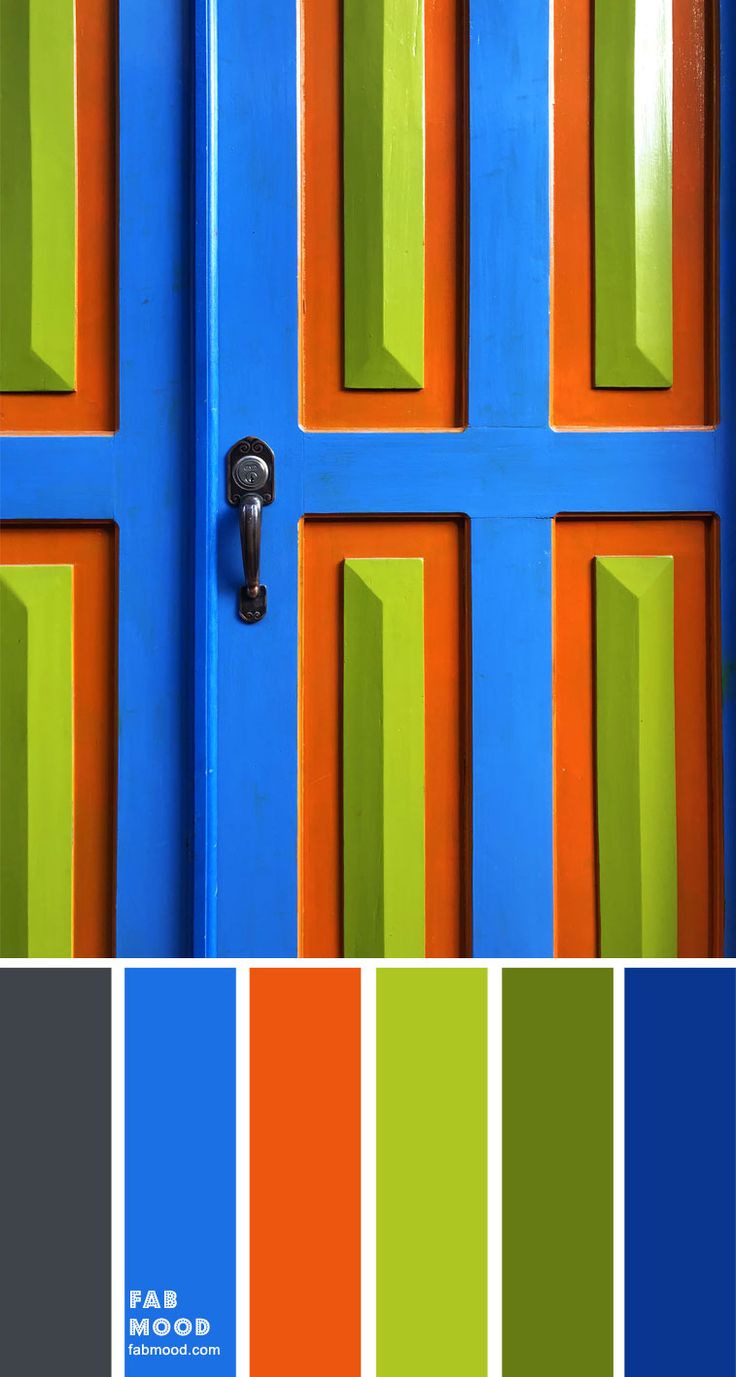a colorful door with alternating blue, orange, and green stripes. the door is made of wood and has a brass handle. the image is abstract and colorful and makes a great background.