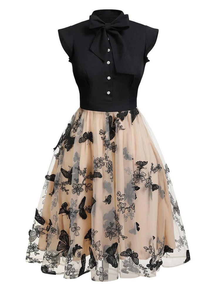 this is a studio image of a vintage style aline dress with a butterfly print. the dress has a black top with a bow tie and a beige tulle skirt with black butterfly embroidery.