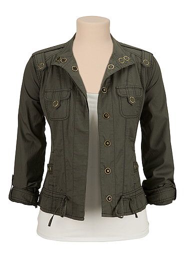 a closeup shot of a green jacket with pockets and buttons. the jacket has long sleeves and is a casual style. it is made of a soft, comfortable fabric. it is perfect for spring and fall weather.