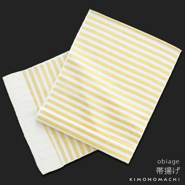 the image shows a yellow and white striped obiage from kimonomachi. the obiage is a japanese kimono accessory.