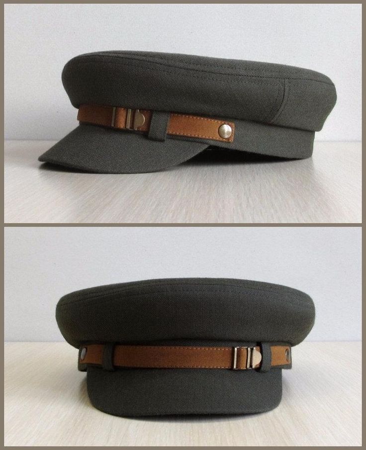 the image shows a green hat with a brown leather strap and buckle. the hat has a classic military style and is a stylish accessory for both men and women.