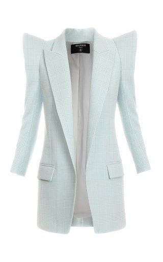 a light blue checkpatterned blazer, possibly by balmain, featuring tailored details and padded shoulders, displayed on a white background.