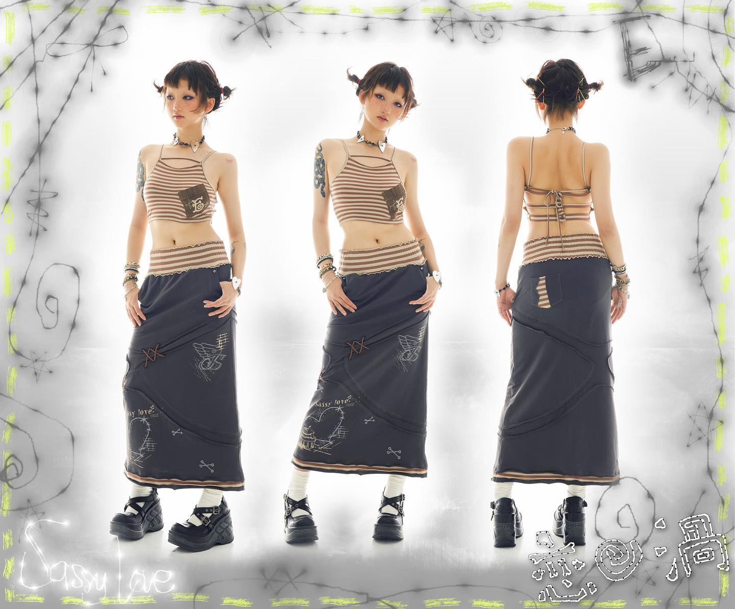 a studio shot features a young woman model showcasing a stylish outfit.  the outfit includes a striped brown tank top, a long, layered gray maxi skirt with various design details (including what appears to be a heart graphic and xs), and platform shoes. the model is shown from the front, side, and back views. the background features a stylized, graffitilike design that incorporates barbed wire elements. the overall style is grungeinfluenced with alternative and potentially japanese fashion elements. the image also includes the text "sassy love" incorporated into the design.