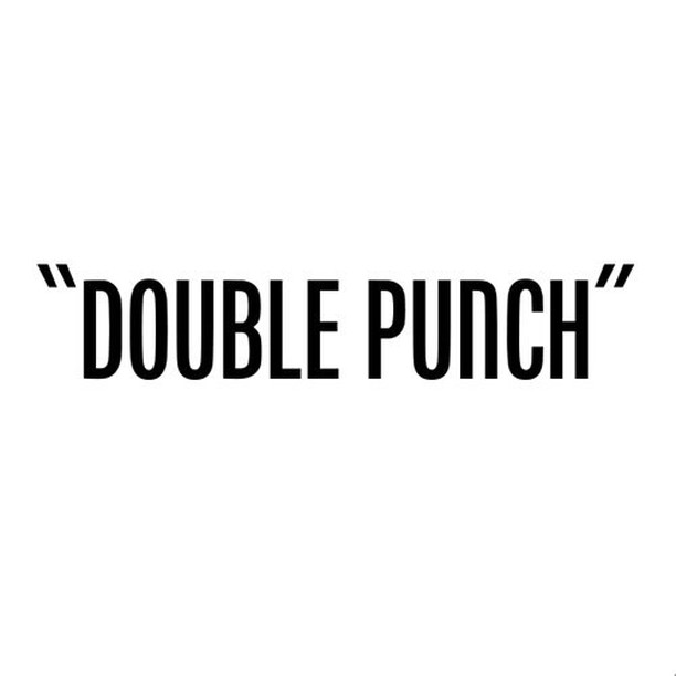 the image features the phrase "“double punch”" in bold, black, sansserif lettering centered on a white background.  the quotation marks are included. the style is simple and impactful.