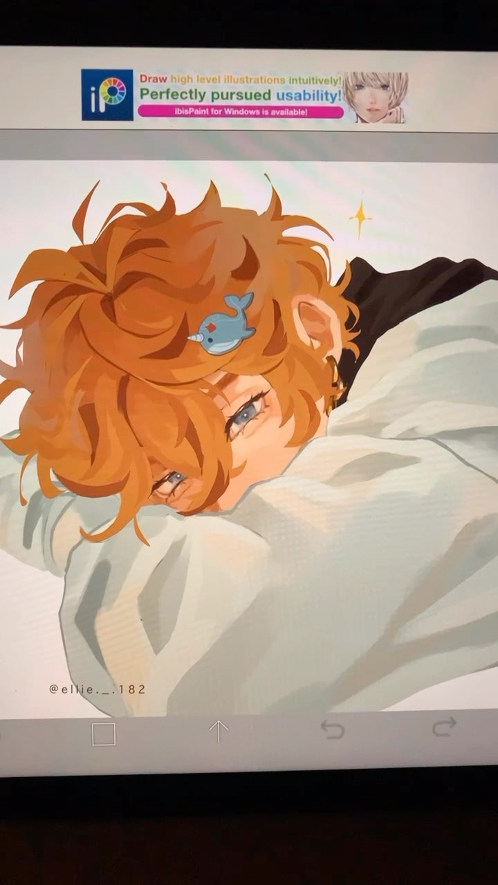 he image shows a digital drawing of an animestyle boy with orange hair. he is lying down, seemingly sleepy, with his head resting on his arm. he has a small narwhalshaped hair clip in his hair. the art style is soft and painterly, with a focus on soft color blending and light shading. the drawing is displayed on a tablet screen, and the screen shows buttons for undo, redo, and other actions.  a small advertisement for ibis paint is visible at the top of the image. the artist's handle, @elle._182, is visible in the bottom left corner of the artwork.