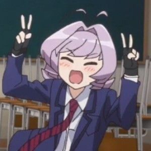 the image depicts a cheerful anime girl wearing a dark blue school uniform consisting of a blazer and tie.  her hair is short and purple, and she is making a peace sign with both hands. she has a wide, joyful smile and rosy cheeks, suggesting happiness and excitement.  the background shows a classroom setting with desks and a chalkboard, enhancing the schoolgirl theme. the art style is consistent with modern anime and manga aesthetics.
