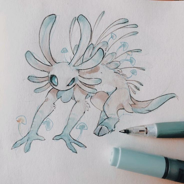 the image is a watercolor drawing of a fantasy creature with blue and beige coloring. the creature is fourlegged and has multiple appendages resembling plants or fungi sprouting from its head and back. there are also small mushrooms near its feet. a pen and a marker lay beside the drawing on the paper.