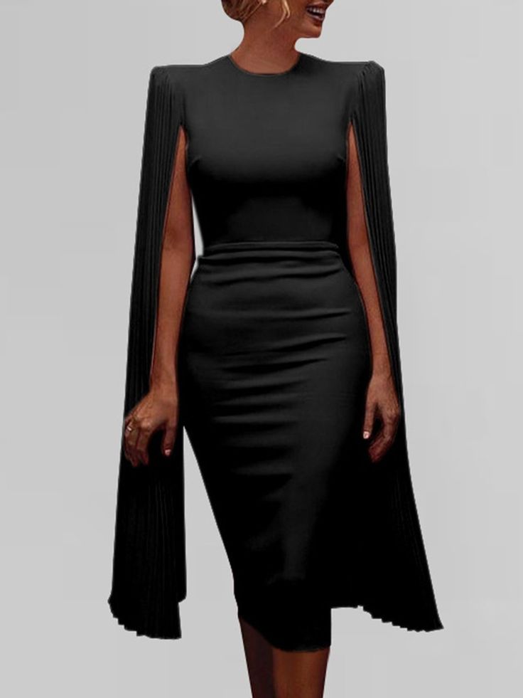 the image shows a woman wearing a black midi dress with pleated cape sleeves. the dress is fitted and kneelength, and it has a round neckline. the woman is standing against a white background. the dress is elegant and sophisticated, and it would be perfect for a formal occasion.