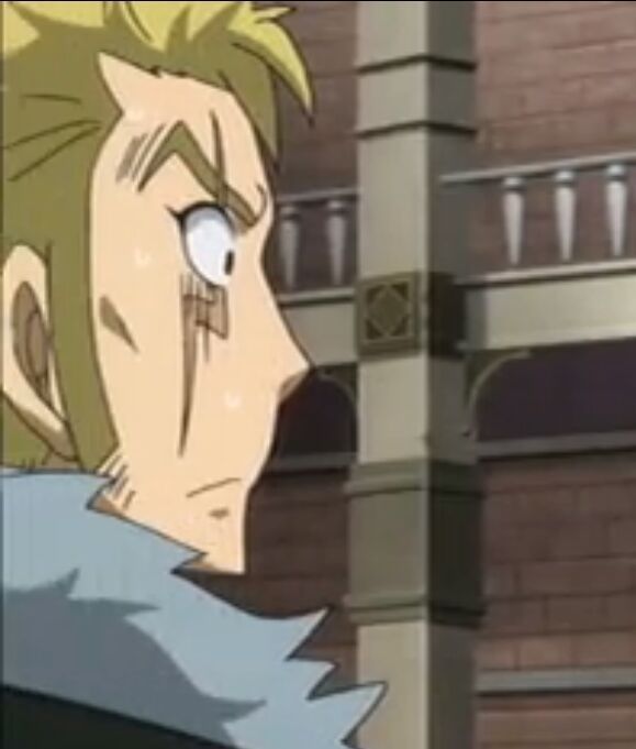 a male anime character with blonde hair is seen looking away with a worried and concerned expression. he is wearing a long coat and is standing in front of a tall building. he is looking to the side with a frown on his face. the background is a city setting.