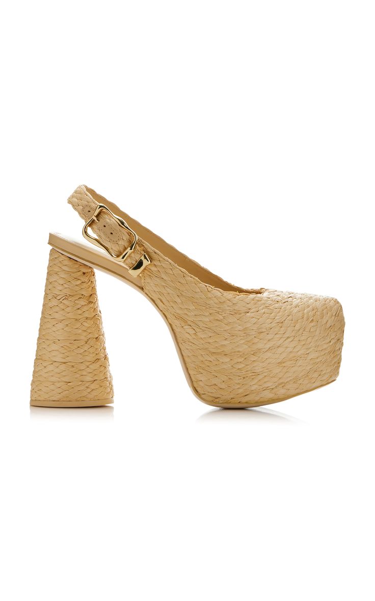 a pair of women's platform sandals with a slingback design and woven straw upper and heels. the shoes are a light brown color. the shoes are perfect for summer.